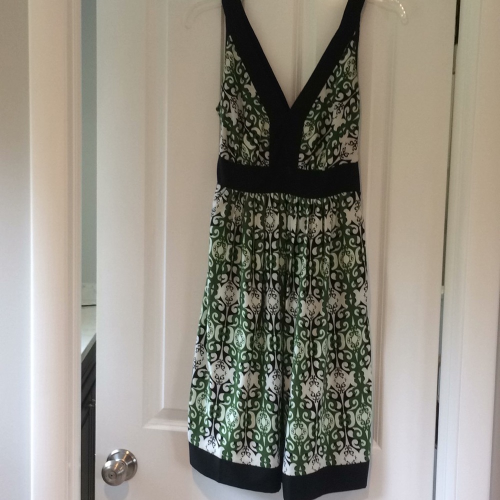 Green black and white dress